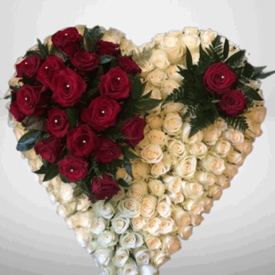 White rose heart with red rose spray